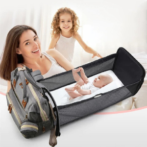 Multi-functional baby diaper bag & Bed